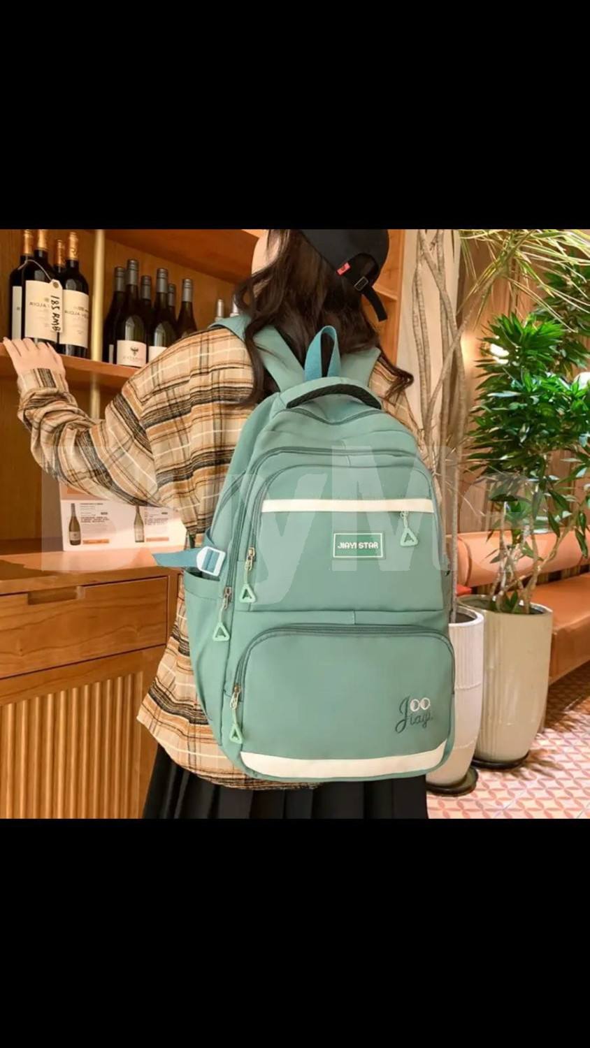 GREEN BACKPACK