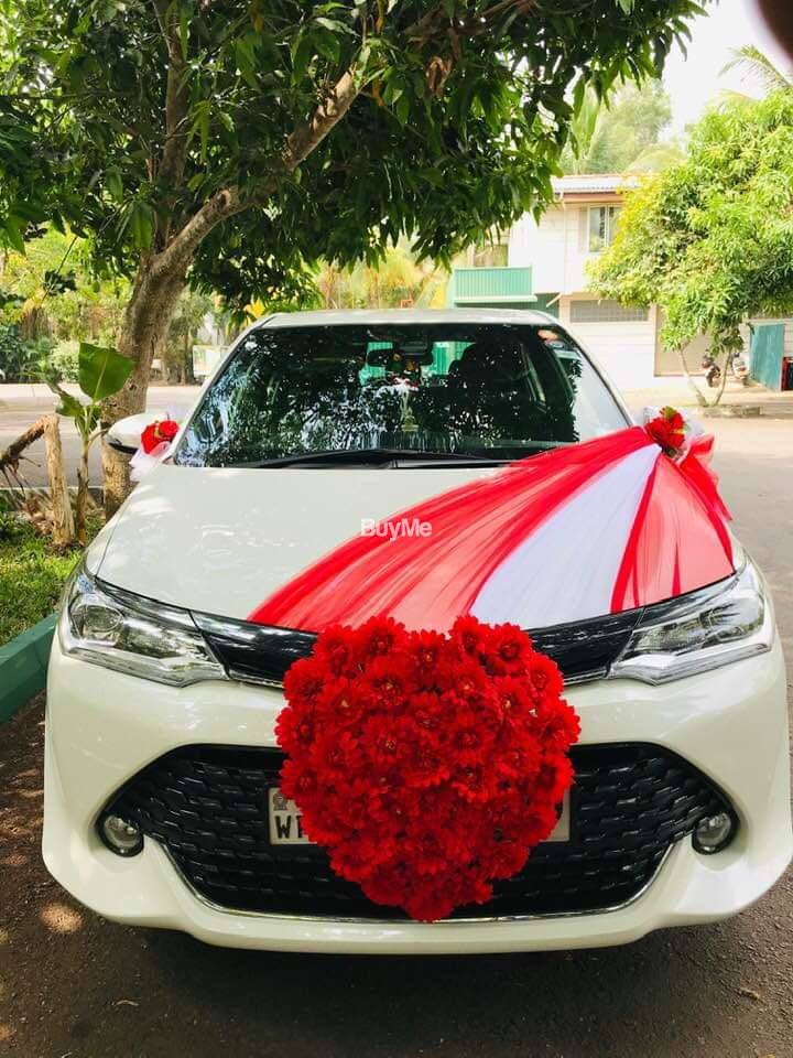 AXIO HYBRID - WEDDING CAR RENT