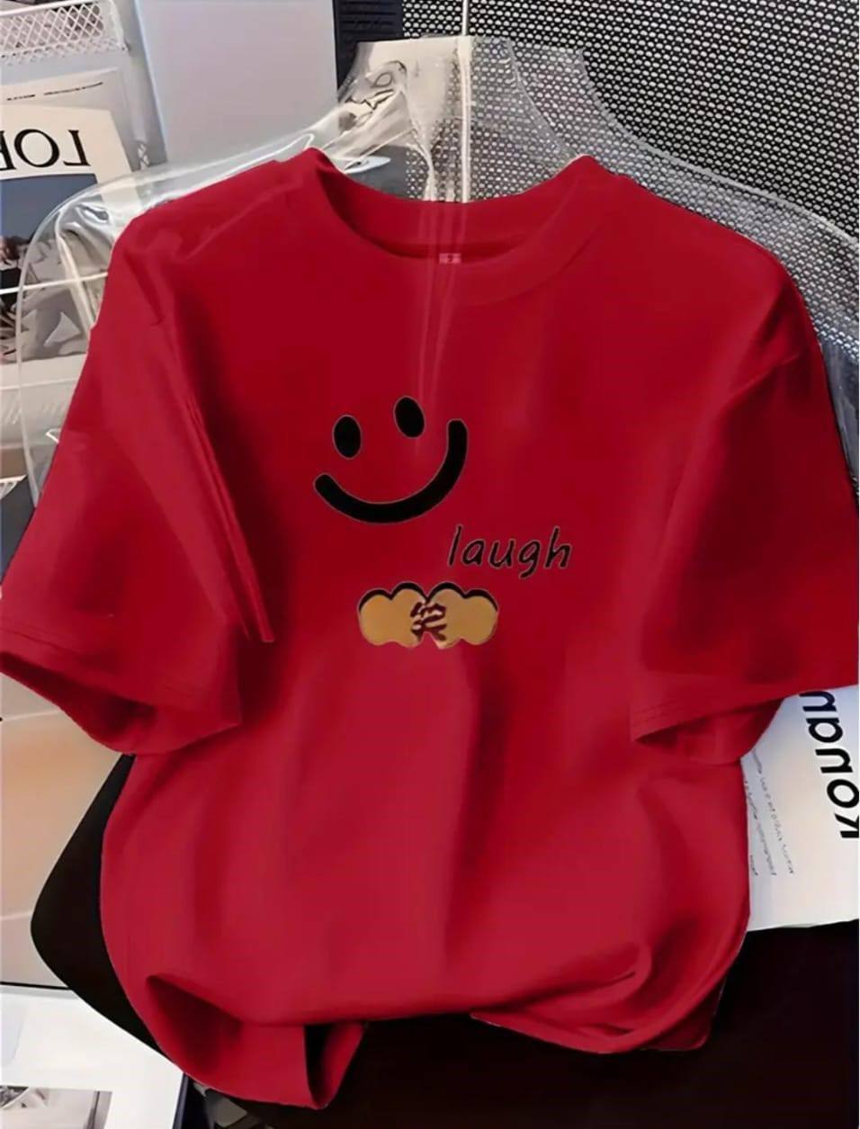 RED T-SHIRT WITH 'LAUGH' PRINT