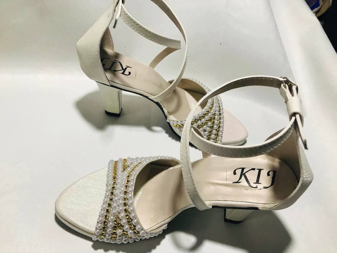 WHITE HEELS