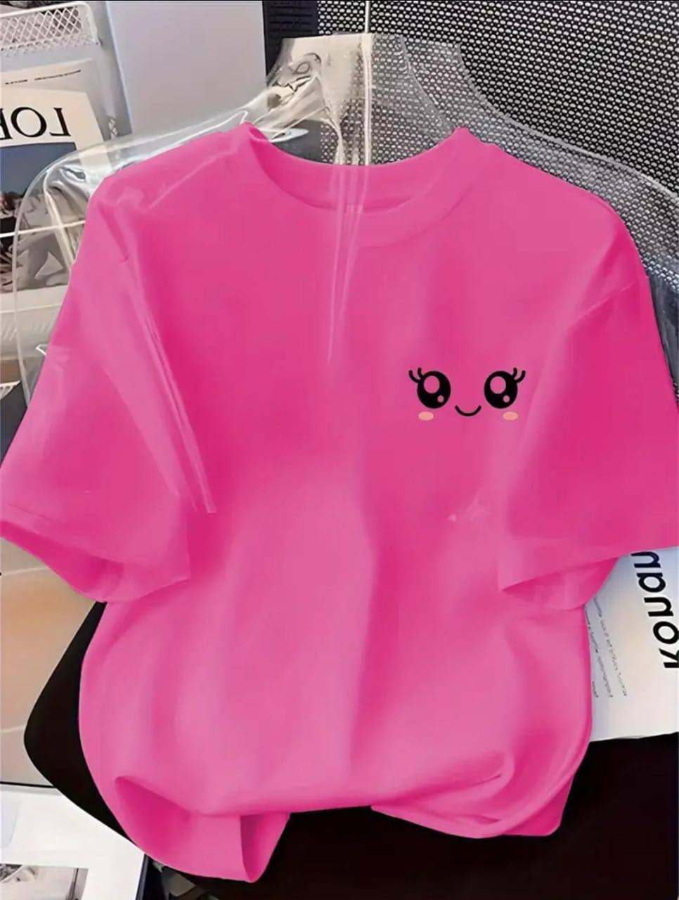 PINK TEE WITH A SMILEY FACE PRINT