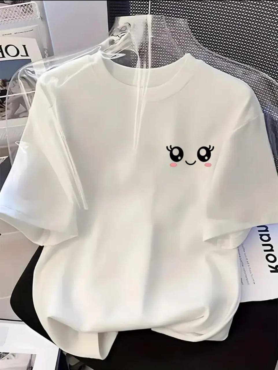 WHITE TEE WITH A SMILEY FACE PRINT