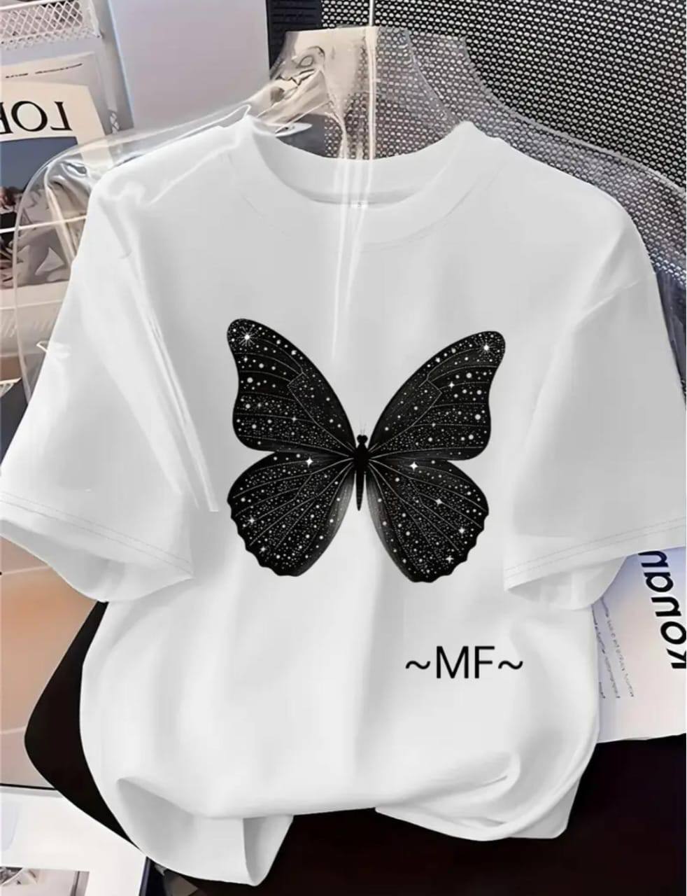 WHITE TEE WITH A BLACK BUTTERFLY PRINT
