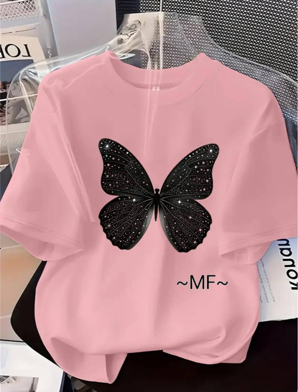 PINK TEE WITH A BLACK BUTTERFLY PRINT
