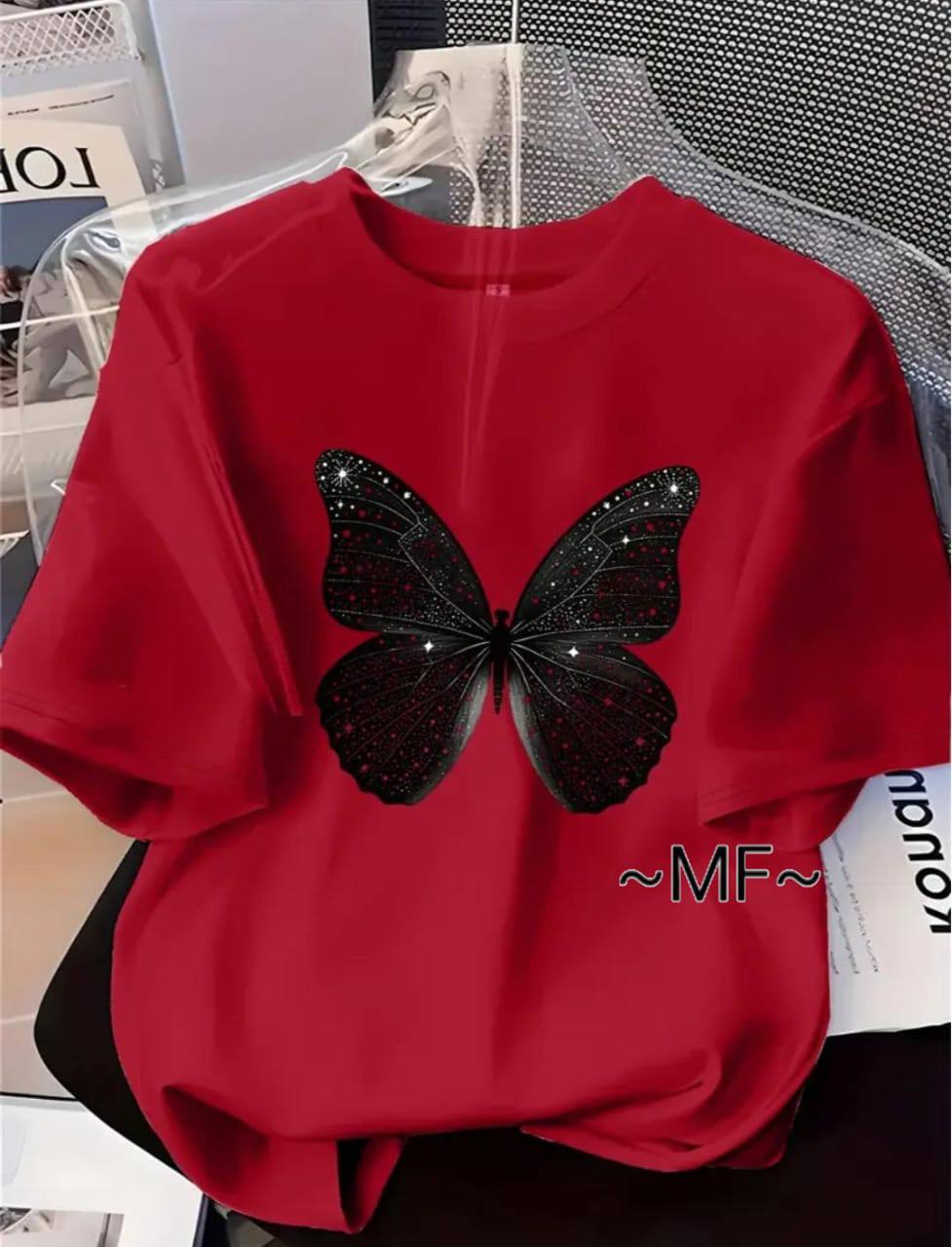 RED TEE WITH A BLACK BUTTERFLY PRINT