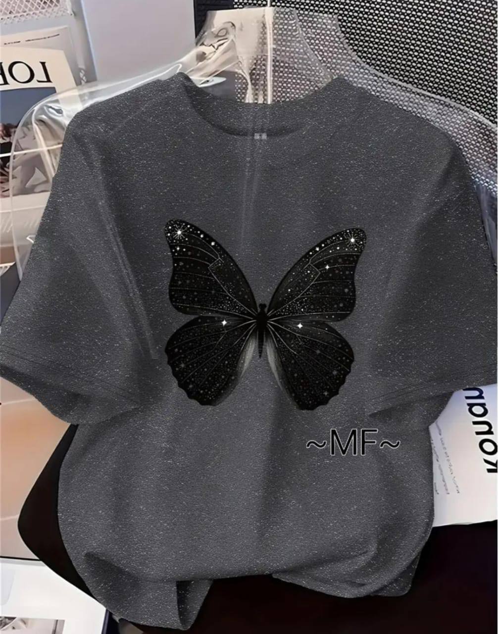 GREY TEE WITH A BLACK BUTTERFLY PRINT
