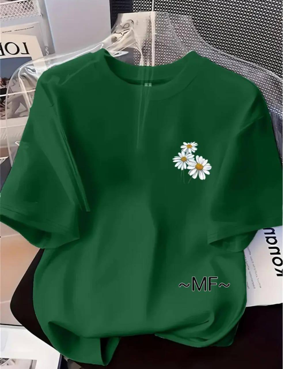 DARK GREEN TEE WITH A FLORAL DESIGN