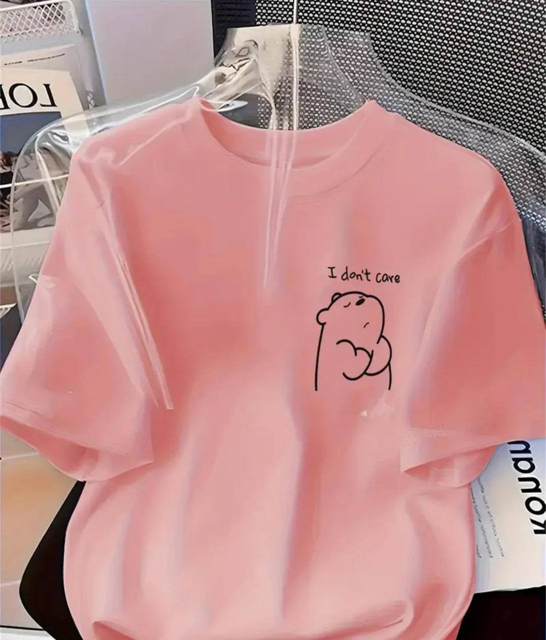 DAZZLING TEE WITH “I DON’T CARE” PRINT – SALMON PINK