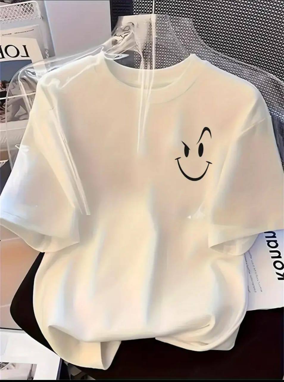 WHITE TEE WITH AN ATTITUDED SMILEY FACE PRINT