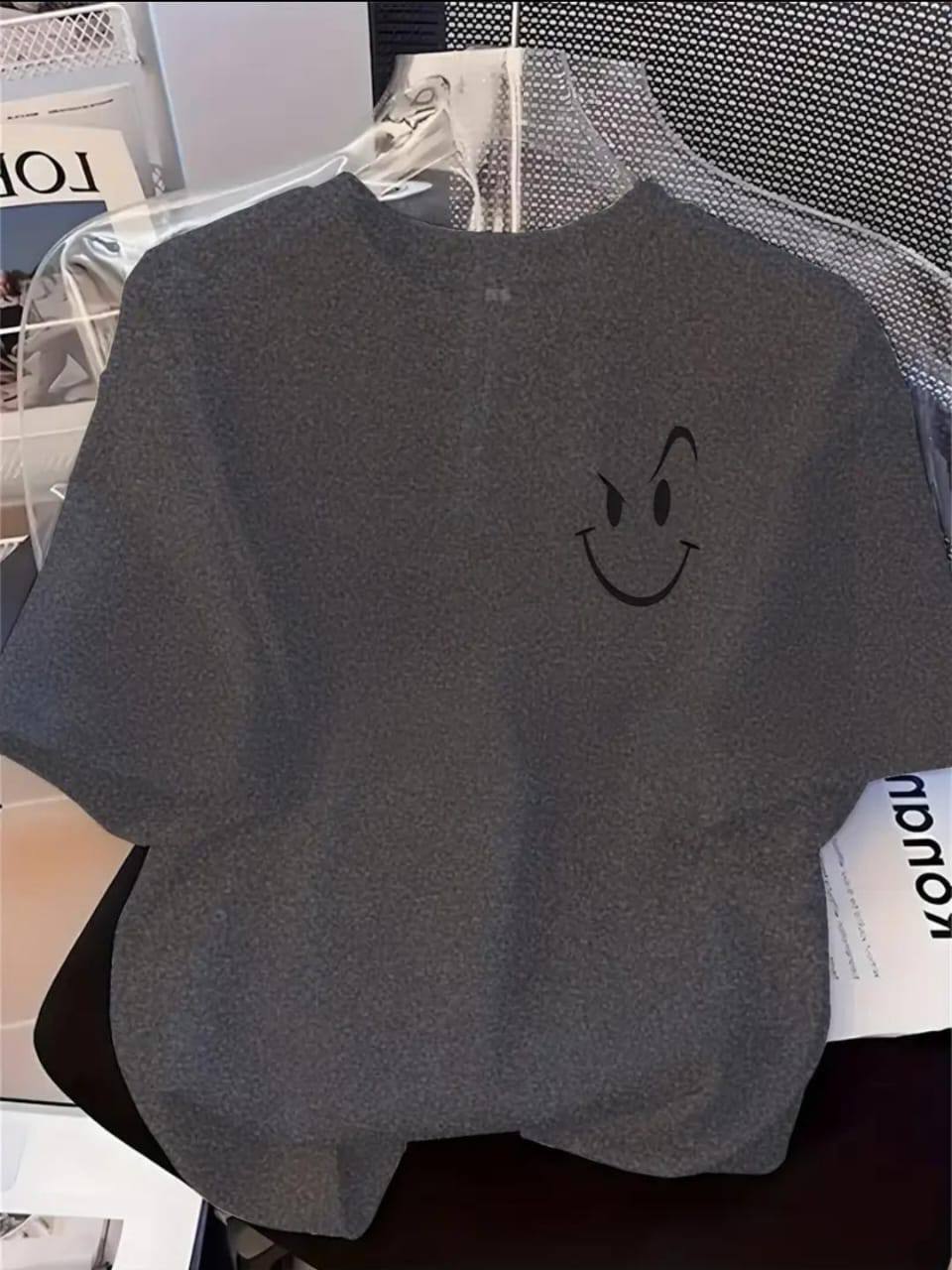 GREY TEE WITH AN ATTITUDED SMILEY FACE PRINT